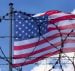 An American flag flying behind barbed wire at the U.S. southern border with Mexico. (Photo: AdobeStock)