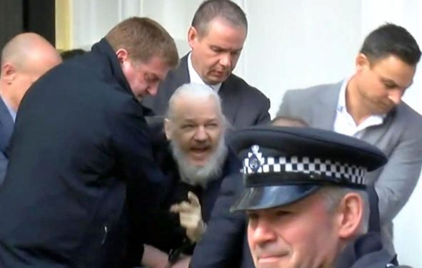 WikiLeaks founder Julian Assange physically removed from the Ecuadorian Embassy. (Photo: Screenshot)