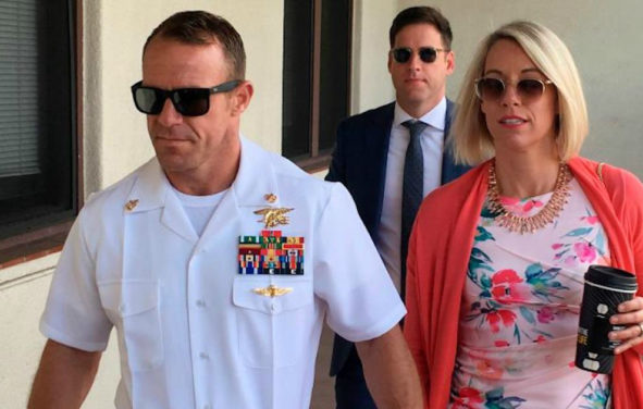 U.S. Navy SEAL Chief Edward Gallagher, left, and his wife, Andrea Gallagher arrive at military court Monday.