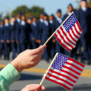 Flag waving at a Veterans Day parade. (Photo: AdobeStock)