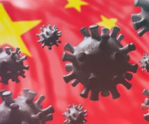 China coronavirus cells to illustrate epidemic pandemic flu virus infection, with a Chinese flag background. (Photo: AdobeStock)