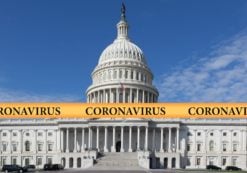 A graphic concept of the coronavirus on a yellow police tape against the backdrop of the Capitol Building in Washington DC. (Photo: AdobeStock)