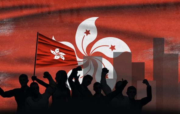 Hong Kong Flag in the background with protesting crowd to illustrate demonstrations and political relations in Hong Kong. (Photo: AdobeStock)