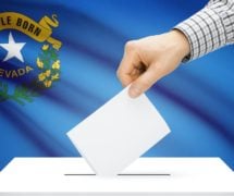 Voting, elections and state polls concept: Ballot box with state flag in the background - Nevada. (Photo: AdobeStock)