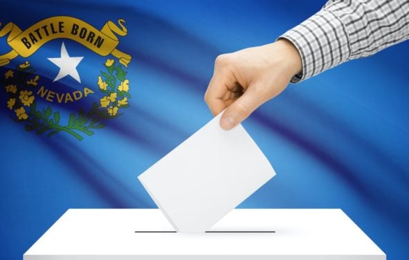 Voting, elections and state polls concept: Ballot box with state flag in the background - Nevada. (Photo: AdobeStock)