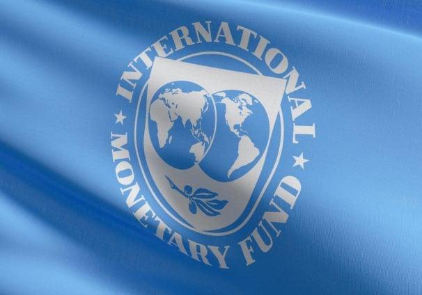 Flag of International Monetary Fund or IMF, an international organization that aims to promote international trade and monetary cooperation and the stabilization of exchange rates. 3D illustration. (Photo AdobeStock)